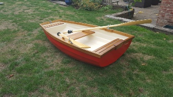Pram dinghy. Traditional clinker dinghy. Yacht tender. 