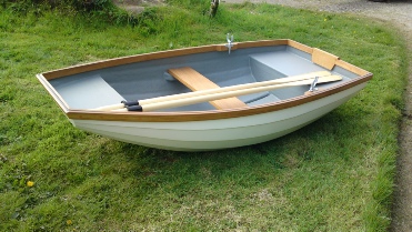 Pram dinghy. Traditional clinker dinghy. Yacht tender. 